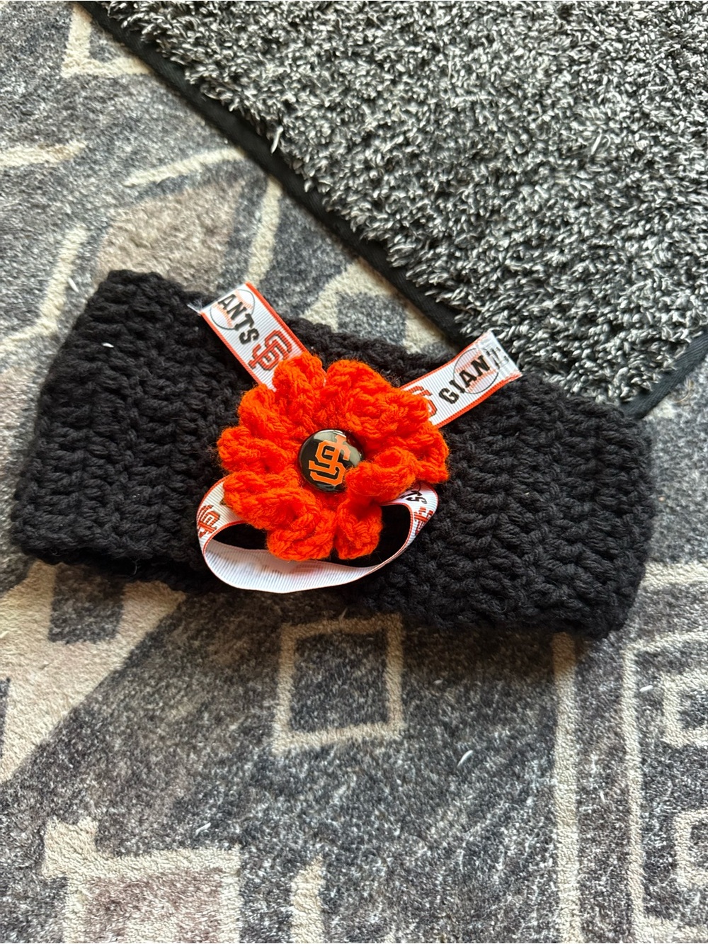 Crochet Headband with Orange Flower